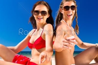 Girls enjoying freedom on the beach