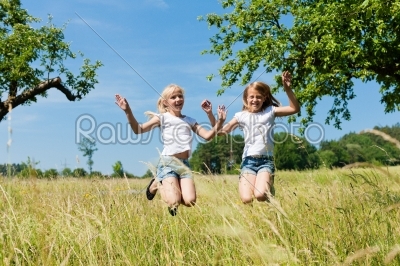 Happy children in a meadow