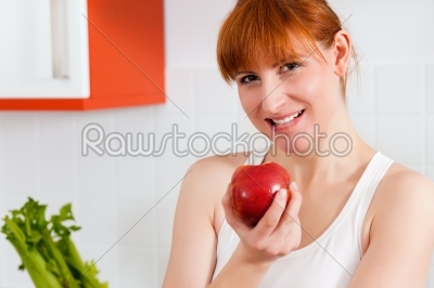 Healthy eating - woman with apple