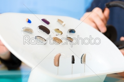 Hearing aid on a presentation table