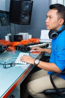 Indonesian man in recording studio