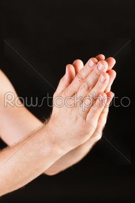 Male hand praying 