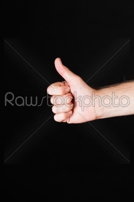 Male hand showing thumbs up 