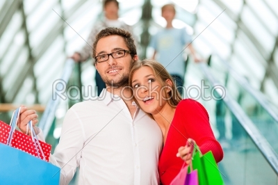 Man and woman in shopping mall 