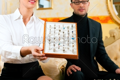 Man choosing a ring at the jeweller