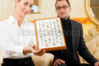 Man choosing a ring at the jeweller