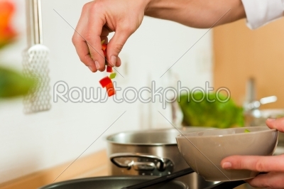 Man cooking in kitchen