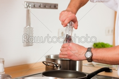 Man cooking in kitchen