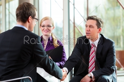 Man having an interview with manager and partner employment job