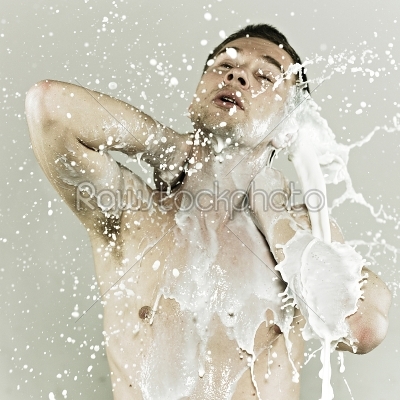 Man in sprays milk