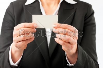 Mature woman showing her business card
