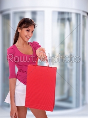 Modern woman shopping in mall 