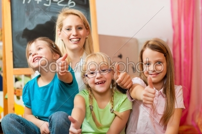 Mother with schoolchildren
