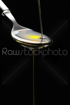 olive oil on a spoon