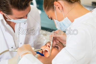 Patient with Dentist - dental treatment