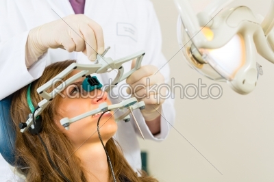 Patient with Dentist - dental treatment