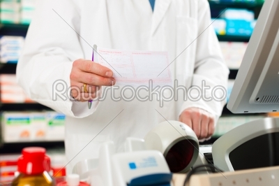Pharmacist prescription slip in pharmacy
