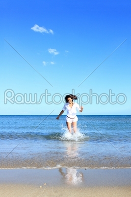 Photograph of a beautiful woman on the beach