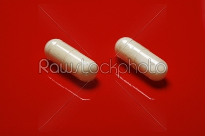 pills on red background