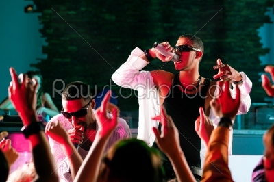 Rap or Hip-Hop Musicians performing on stage