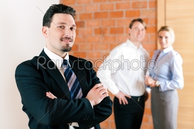 Realtor in apartment with couple