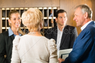 Reception - Guests check in a hotel