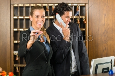 Reception in hotel - Man and woman