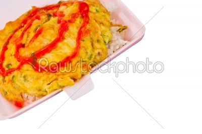 Rice, topped with omelette. 