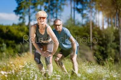 Senior couple doing sport outdoors