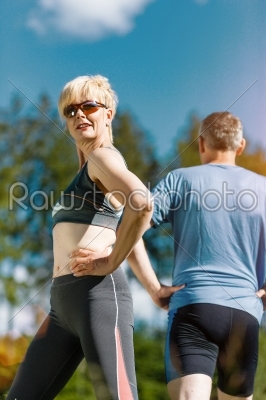 Senior couple doing sport outdoors