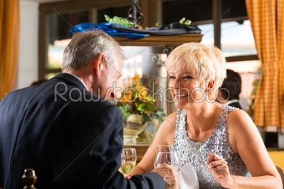 Senior couple fine dining in restaurant