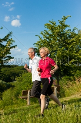 Senior couple jogging for sport