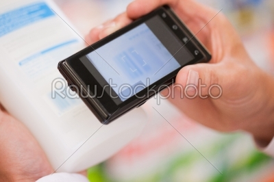 Shopper Clicking Taking Picture of Product_qt_s Information
