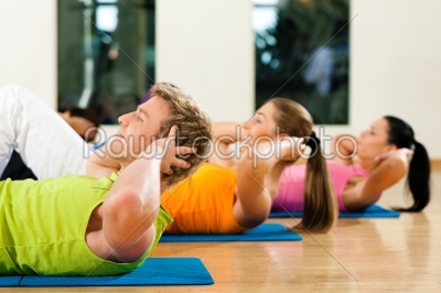 Sit-ups in gym for fitness