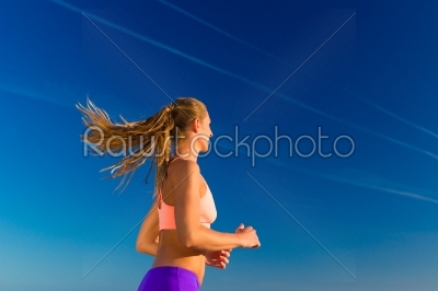 Sport and Fitness - woman jogging 