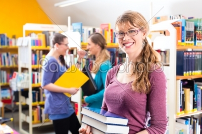 Students learning in library
