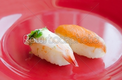 sushi on red dish