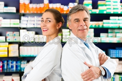 Team of pharmacists in pharmacy 