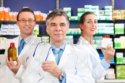 Team of pharmacists in pharmacy