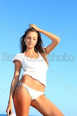 The beautiful bikini model posing 