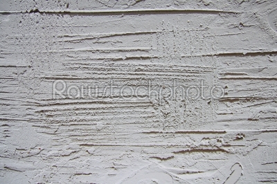 The white plastered relief wall