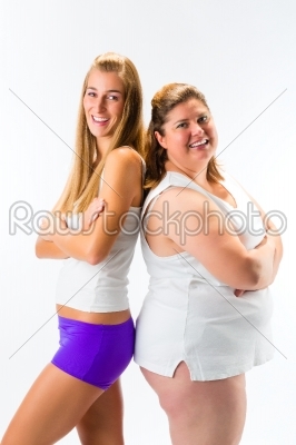 Thin and fat woman standing and smiling