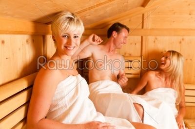 Three people in sauna