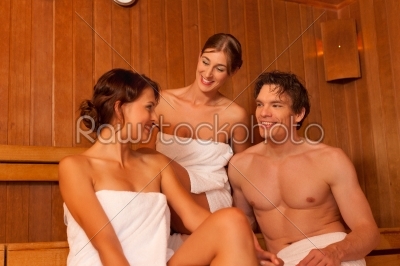 Three people or friends in sauna
