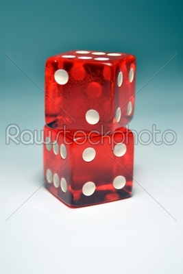 Two Red Dice on top of another
