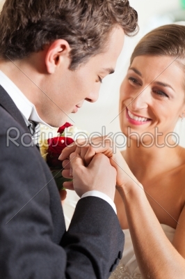 Wedding couple giving promise of marriage