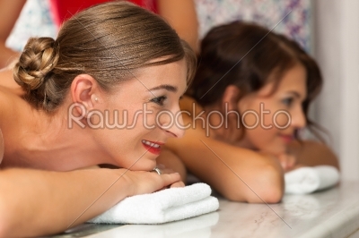 Wellness - female friends getting a massage