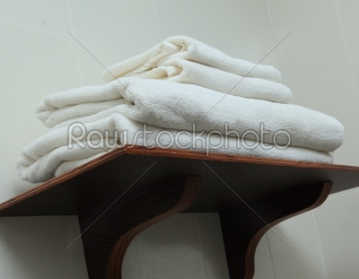White Towel on Shelf