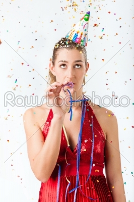 Woman at boring birthday party with streamer
