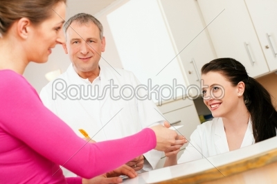 Woman at reception of clinic